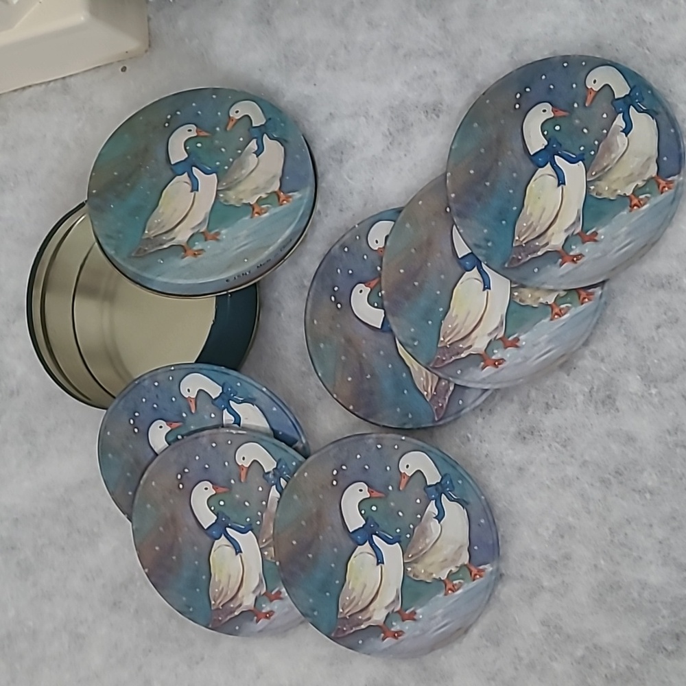 Vintage J.S.N.Y. set of six winter geese coasters with a matching storage tin